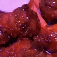 Chicken Wings · Lightly breaded chicken wings, tossed in or served with your choice of sauces: Zing Zing , S...