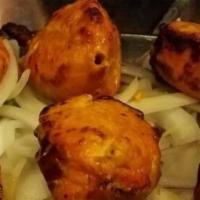 Chicken Tikka · Boneless chicken breast marinated in spices, tandoor grilled.