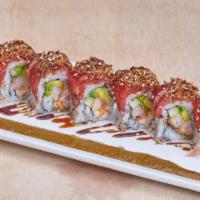 Keoni Roll · Rolled with tempura shrimp, crab mix, cucumber and avocado. Topped with peppercorn seared ah...
