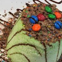 Mint Chocolate Chip · Mint snow, crushed M&MS, chocolate sauce.