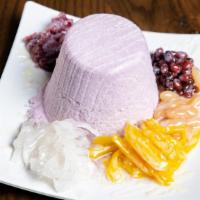 Halo-Halo · Taro shaved snow, jack fruit, macapuno strings, red and white sweetened beans, flan, condens...