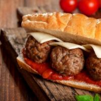 The Meatball Sandwich · Delicious sandwich made on a toasted Gibaldi's Italian roll with seasoned meatballs, marinar...