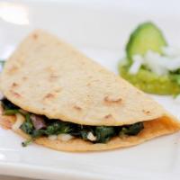 Vegetarian Quesadilla · Sauteed mushrooms, spinach, bell peppers, carrots.  Handmade to order on 100% gluten free co...