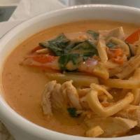 Red Curry · Spicy. Moderated curry with bamboo shoots, eggplant bell peppers, and basil leaves.