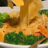 Spicy Curry Noodles · Spicy. Steamed flat rice noodles with broccoli and carrot in spicy red curry sauce.