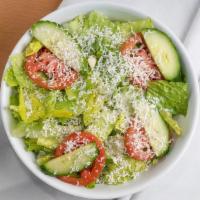 Garden Green Salad · Romaine Lettuce, Cucumbers, Tomatoes, Feta Cheese with House Dressing on the Side.