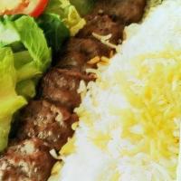 Ground Beef Kabob · Choice of 2 side dishes:  Green salad, Basmati rice, hummus, must-khiar or grill tomato.  Pi...