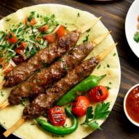 Lule Kabob Plate · Marinated Ground beef skewers grilled to perfection. Served with customer's choice of side, ...