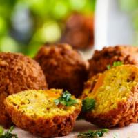 Falafel Solo · Our house-made, golden fried falafel balls made with chickpeas, fresh herbs and house season...