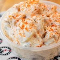 Housemade Potato Salad · contains red onions