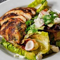 Little Gem Lettuces Salad · Avocado, radish, goat cheese, and fines herbs vinaigrette.