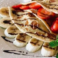 #11. La Vivienne Sweet Crepe · Nutella spread with slices of fresh strawberries and banana