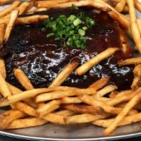 Bbq Baby Back Ribs Appetizer · A half portion of our tender slow smoked ribs, either dry rubbed or smothered in our signatu...