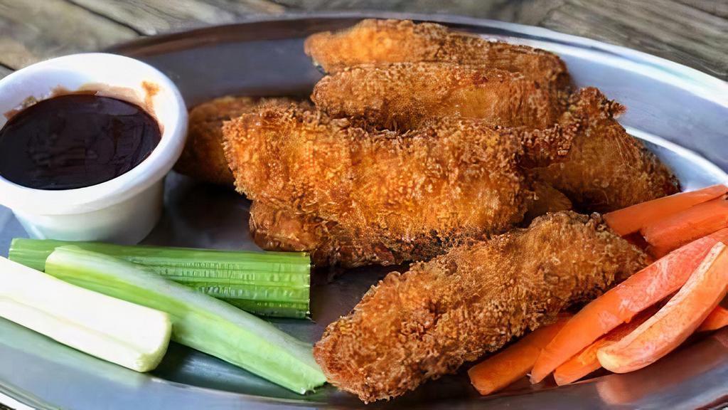Crispy Chicken Strips · Hand-breaded and deep fried chicken tenders, served with BBQ and honey mustard dipping sauces.
