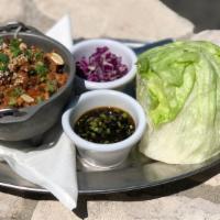 Spicy Chicken Lettuce Wraps · Spicy. A fresh and flavorful blend of chicken, shiitake mushrooms, garlic, ginger and red be...