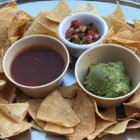 Chips & Guacamole · Platter of tortilla chips, fire-roasted salsa and fresh guacamole.