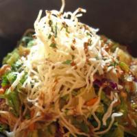 Thai Peanut Crunch Salad Full · A saddle ranch chop house signature dish. Crisp romaine lettuce, pulled chicken breast, carr...