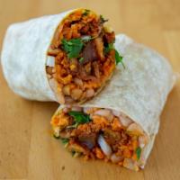 Burrito · Rice, whole beans, onion, cilantro, wrapped in a flour tortilla.