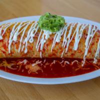Wet Burrito · Rice, whole beans, onion, cilantro, wrapped in a flour tortilla topped with housemade salsa,...