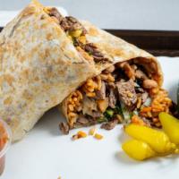 Carne Asada Burrito · Carne asada with tomatos, onions, cilantro, beans, and rice.