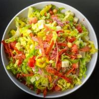 Italian Chopped Salad · Lettuce, Salami, pepperoni, Mozzarella, Garbanzo, Tomato, Pepperoncini & Champagne Vinaigrette