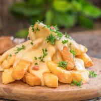Cheese Fries · Our delicious fries covered with melted cheese.