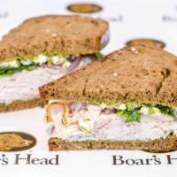 Turkey Pesto · Roasted turkey, feta, cucumber, pesto baby arugula and marinated onion.