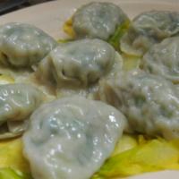L-43. Steamed Dumpling (찐만두/肉馅蒸饺) · (찐만두/肉馅蒸饺): Handmade dumplings with beef and pork, chives, and crushed tofu. Approx. 15 minu...