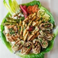 Chicken Shawarma · Platter – slices of grilled chicken shawarma, specially marinated, served with rice, sesame ...