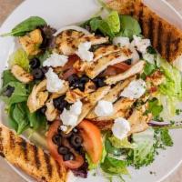 Pollo Salad · Chicken, mixed greens, tomatoes, olives, onion, goat cheese, and balsamic.