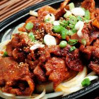 Spicy Bbq Pork (돼지불고기) · Spicy BBQ pork with onions and green onions.
