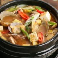 Bean Paste Soup (된장찌개) · Bean paste broth with tofu and vegetables. Choose one - seafood or beef.
