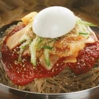 Spicy Cold Noodles (비빔냉면) · Cold buckwheat noodles with spicy sauce.