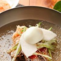 Non-Spicy Cold Noodles (물냉면) · Non spicy cold buckwheat noodles with broth and slices of beef. Topped with an egg.