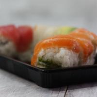 Rainbow Roll · Inside stuffed with crab, avocado, cucumber. Outside salmon, tuna, snapper, and shrimp.