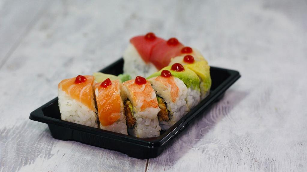 Spicy Rainbow Roll · Inside stuffed with spicy crab, avocado, and cucumber. Outside salmon, tuna, snapper, and shrimp.