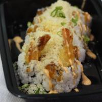 Golden Shrimp Roll · Inside shrimp tempura, crab, and avocado. Outside tempura crunch.