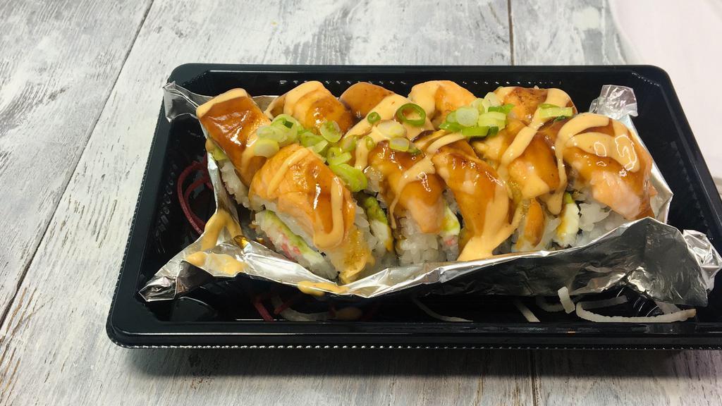 Alsaka Roll · Inside crab, avocado, and cream cheese. Outside baked salmon and green onion.
