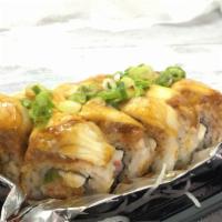 Mountaineer Roll · Inside crab, avocado, and cream cheese. Outside baked white fish, spicy tuna, and green onion.