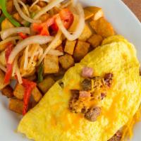 Meat Lovers Omelet · Bacon, ham, sausage and cheddar cheese.
