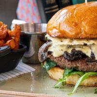 The Impossible™ Burger · delicious plant-based burger, arugula, tomato jam, peppered mushrooms, truffle aioli, parmes...