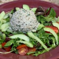 Tuna Salad · Gluten-free and soy-free. Mixed greens, tuna, cucumbers and cherry tomatoes, in our house dr...