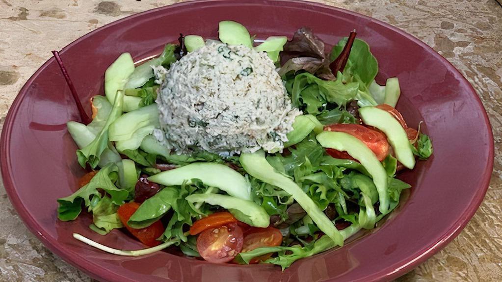 Tuna Salad · Gluten-free and soy-free. Mixed greens, tuna, cucumbers and cherry tomatoes, in our house dressing.