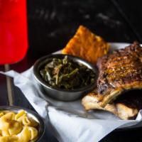 1/2 Rack Baby Back Ribs · 1/2 rack of baby backs, choice of 2 sides and smoked cheddar cornbread.