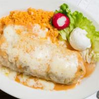 Pepe'S Burrito - Chicken · Onions, bell peppers, tomatoes, and beans, wrapped in A flour tortilla. Topped with ranchera...