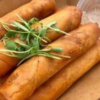 Longganisa Lumpia · 6 pieces of sweet filipino sausage wrapped and deep fried. Need we say more?