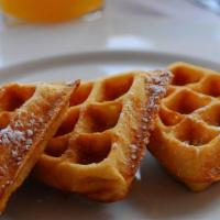 Crispy Waffle · Freshly made waffle topped with butter, mixed berries. maple syrup. powdered sugar and whipp...