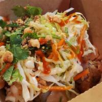Hot Chick Bao · fried chicken, burger sauce, cabbage carrot slaw (carrots, red onion and cabbage tossed in a...