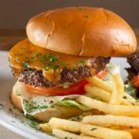 Wild Creek Burger · Half lb burger, aged cheddar cheese, lettuce, onion and tomato, brioche bun.