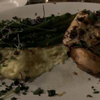 Tuscan Grilled Chicken Breast · Chicken breast marinated with fresh herbs and garlic, mashed potatoes, and seasonal vegetable.